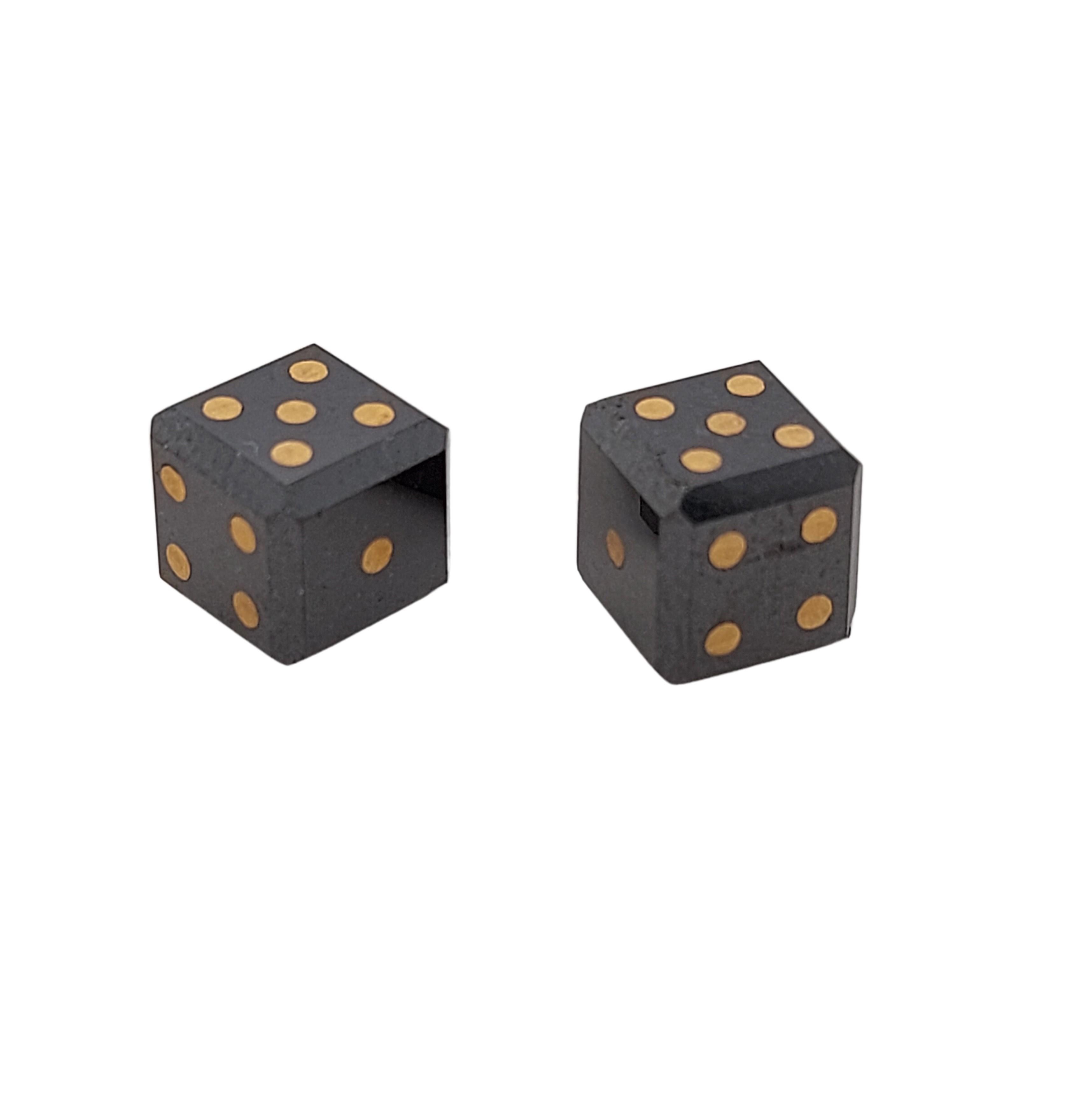 Pair of natural 12,7 Carat black diamond cubes/dice with gold inlay

The dice are inlaid with gold dots to mark their numbers.
The purity of the gold is not tested.

Measurements: 7 mm x 7 mm

Total weight: 2.6 gram / 0.090 oz / 1.7 dwt

Option of