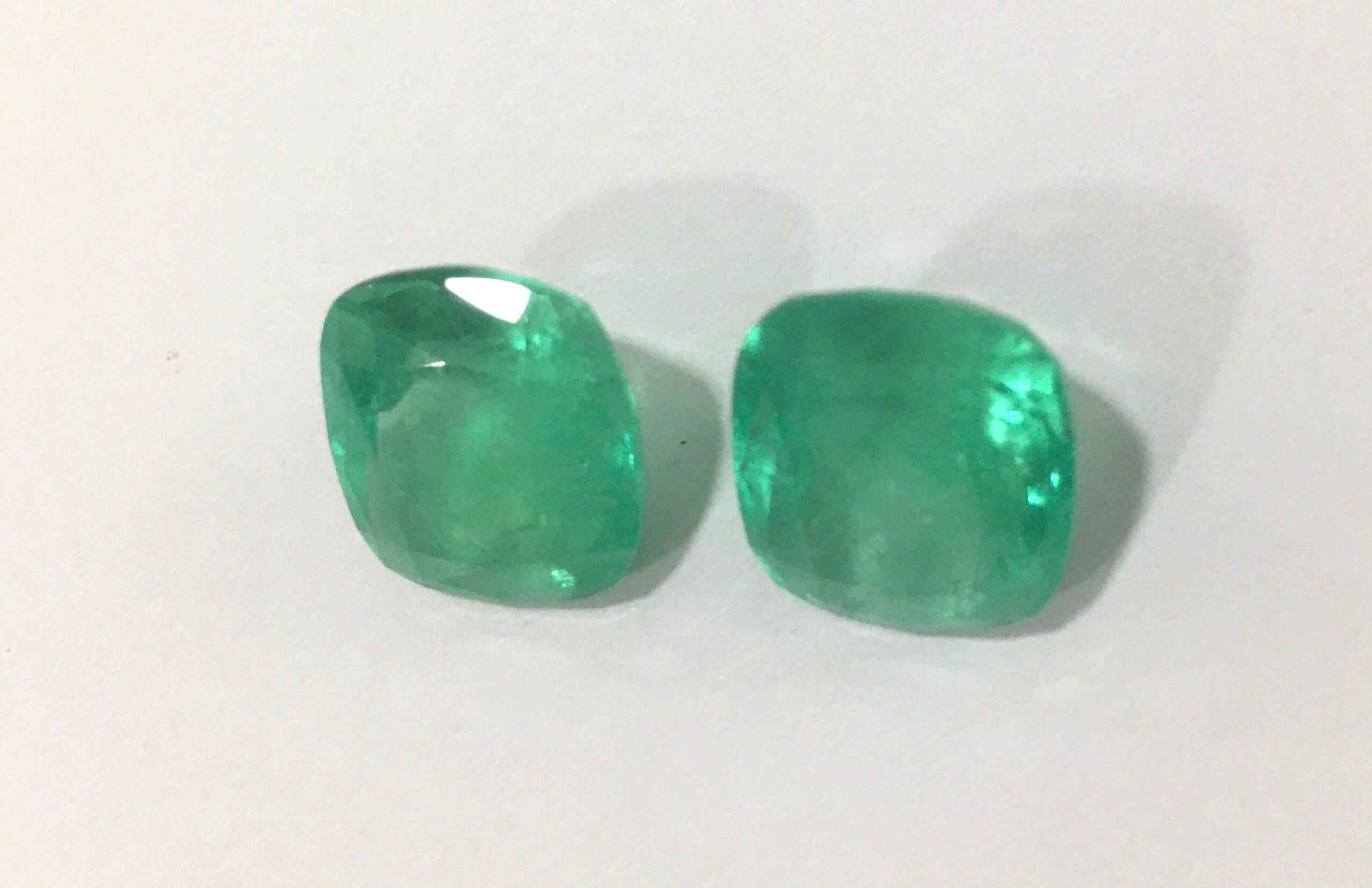 Two natural Colombian emeralds, medium green cushion cut, total weight 11,63 carats(
Good for earrings, ring and or pendant necklace!
*Included Certificate*

The emeralds can be sold as a set or individually. So please contact us for additional