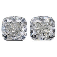 Paire de diamants taille coussin naturels de 1,01 carat au total, G VVS1-VS1, certifis GIA