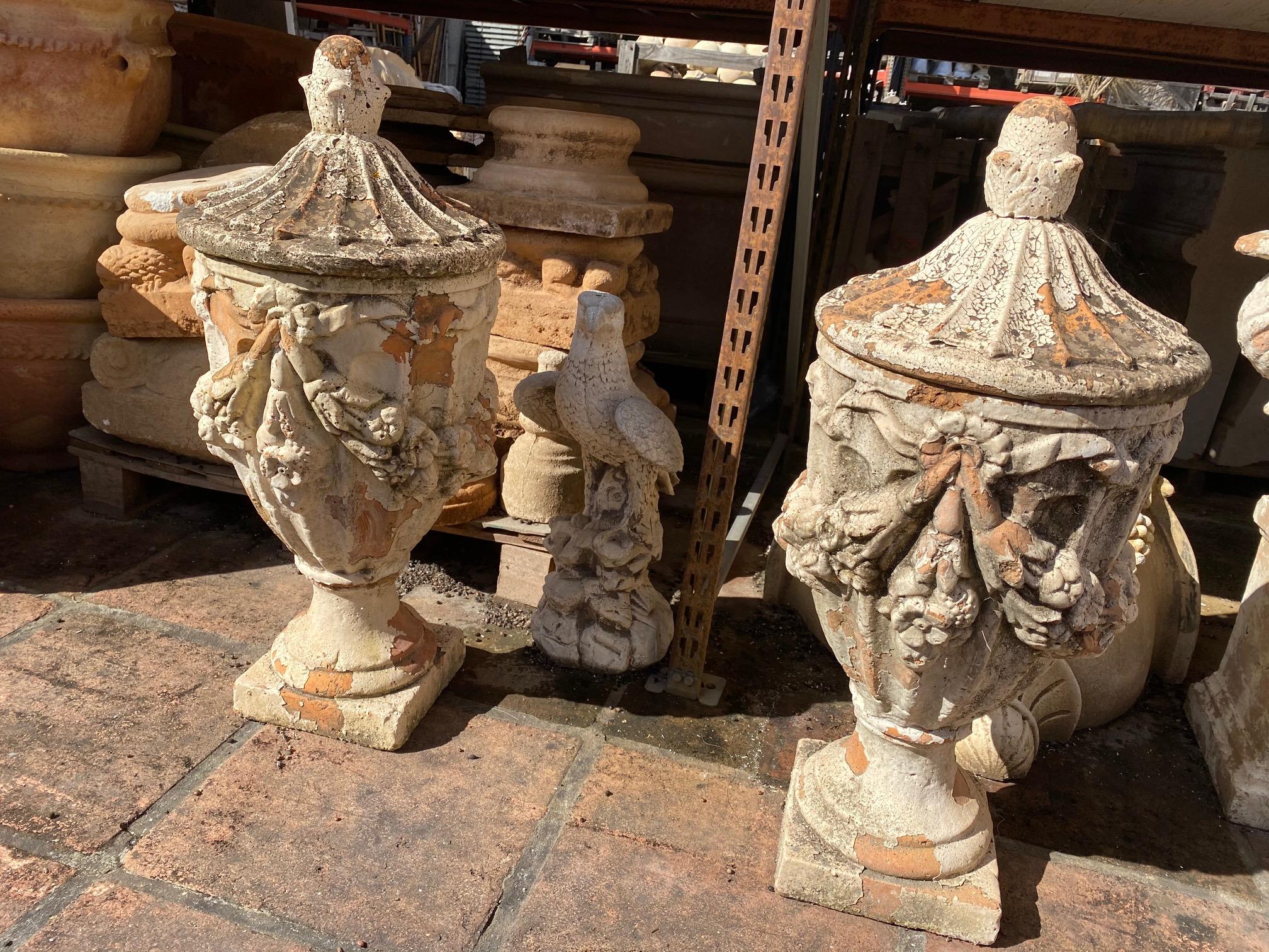 Pair of Natural French Terracotta Urns with Lids