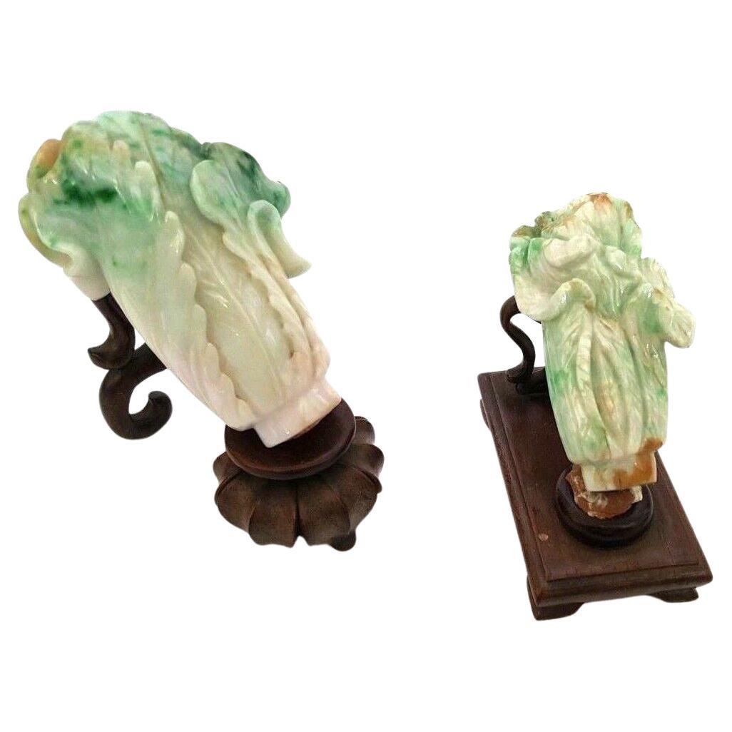 This pair of jadeite Chinese cabbage carvings embodies the timeless symbols of luck and prosperity. Each sculpture is handcrafted, showcasing the artist's exceptional craftsmanship. Inspired by the famous Jadeite Cabbage at the National Palace