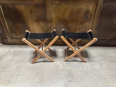 Pair Of Natural Teak and Black Leather Foldable Stools