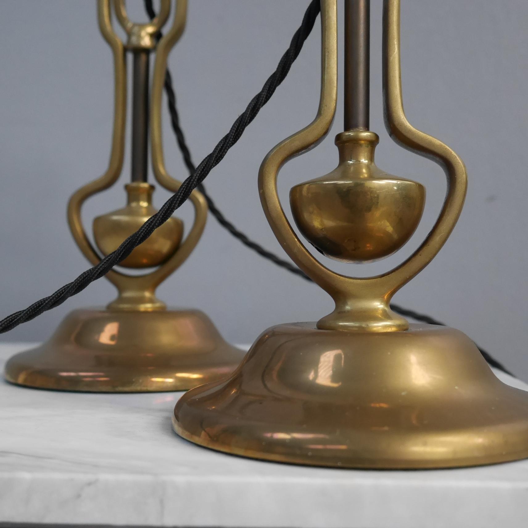 A pair of Playmit nautical brass gimbal lamps.
A wonderful pair of nautical brass gimbal lamps with a the bases supporting articulated, counterweighted arms & with both retaining their original, switched 'matchstick' lamp holders. 
The free-moving