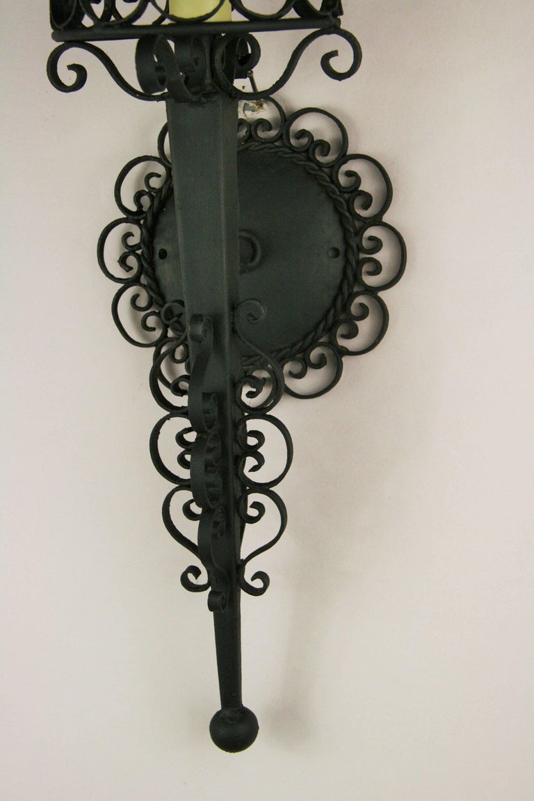 1-4013 pair of scrolled black iron wall lanterns. Each sconces accepts one candelabra base bulb, 60W-max.
Age appropriate wear
Matching chandelier available see 1-4002
Rewired
 