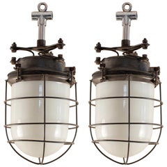 Pair of Nautical Industrial Milk Glass and Steel Caged Pendant Lights