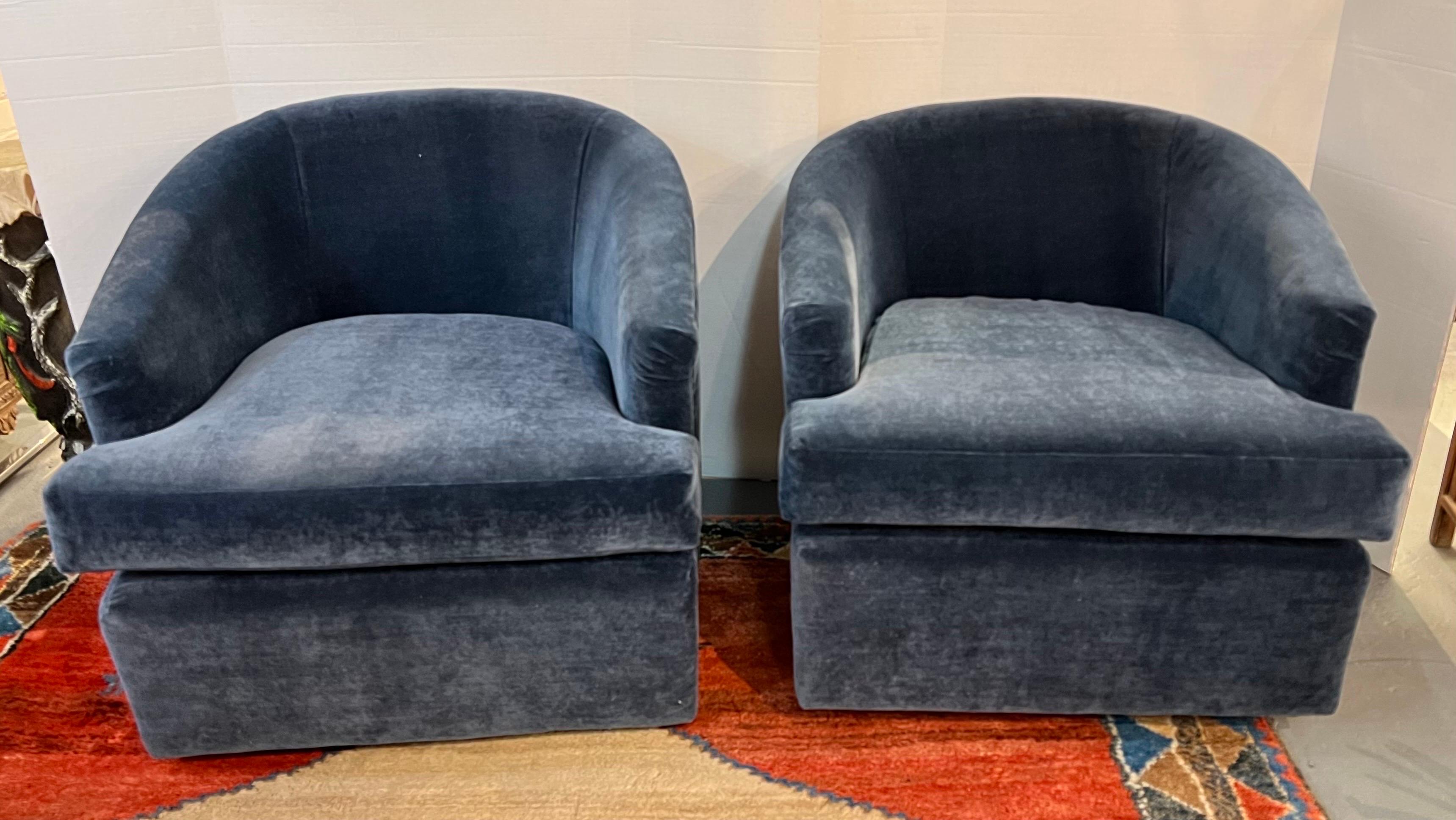 Iconic Mid-Century Modern pair of matching blue velvet swivel chairs.
Great lines and better scale. New Donghia fabric which is tres luxurious.
Perfect condition.