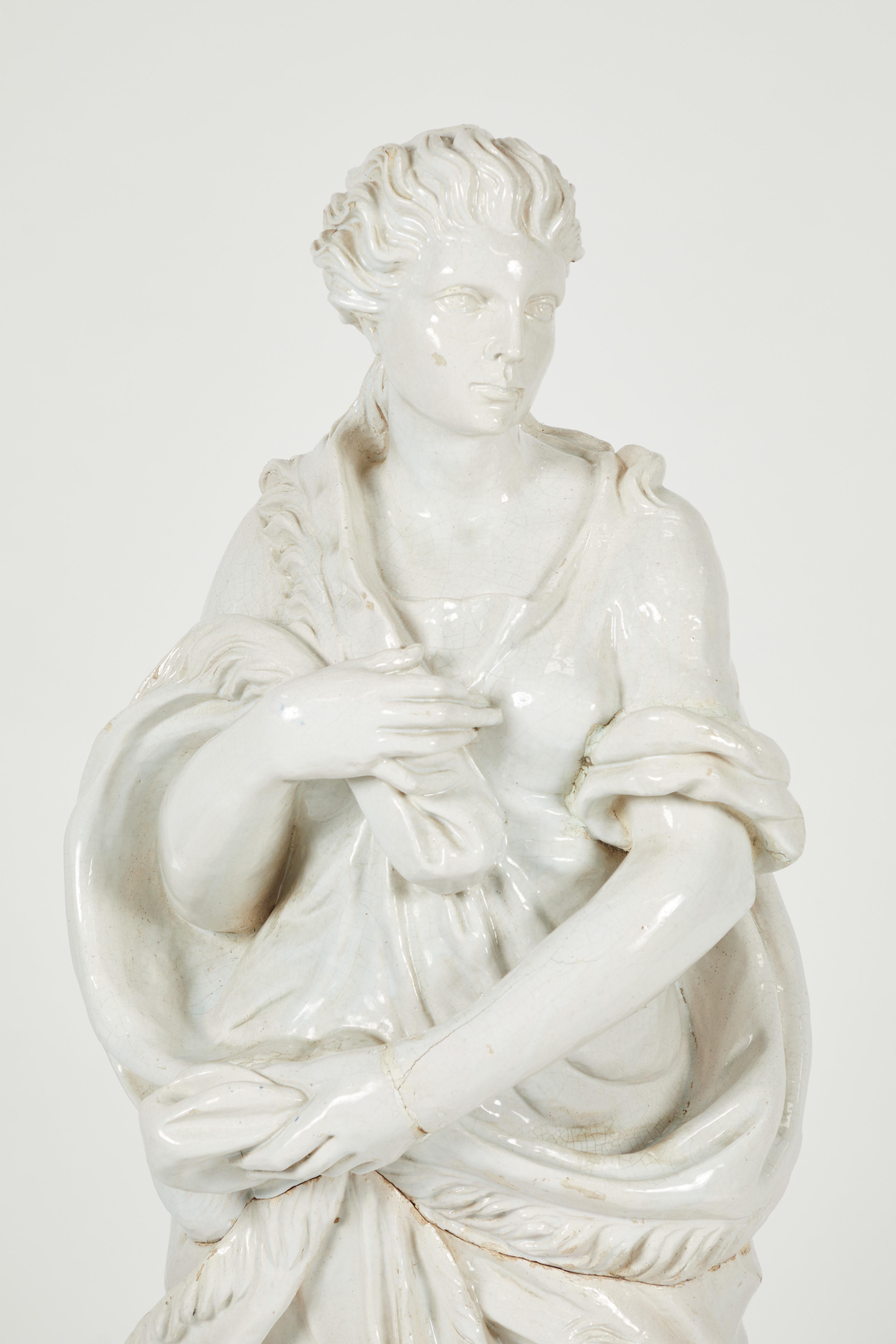 Mid-20th Century Pair of Near Life-Sized Continental Glazed Earthenware Statues For Sale