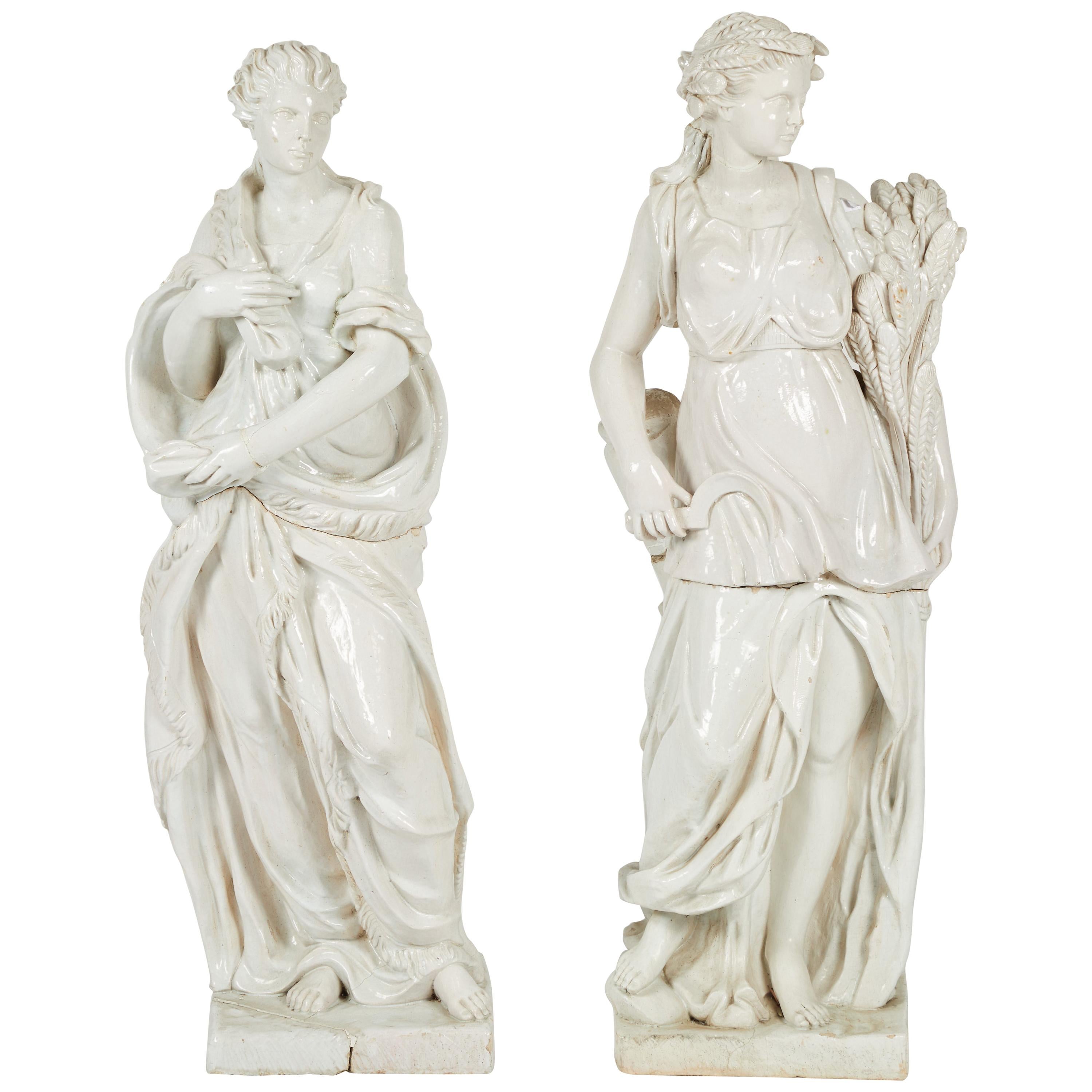 Pair of Near Life-Sized Continental Glazed Earthenware Statues