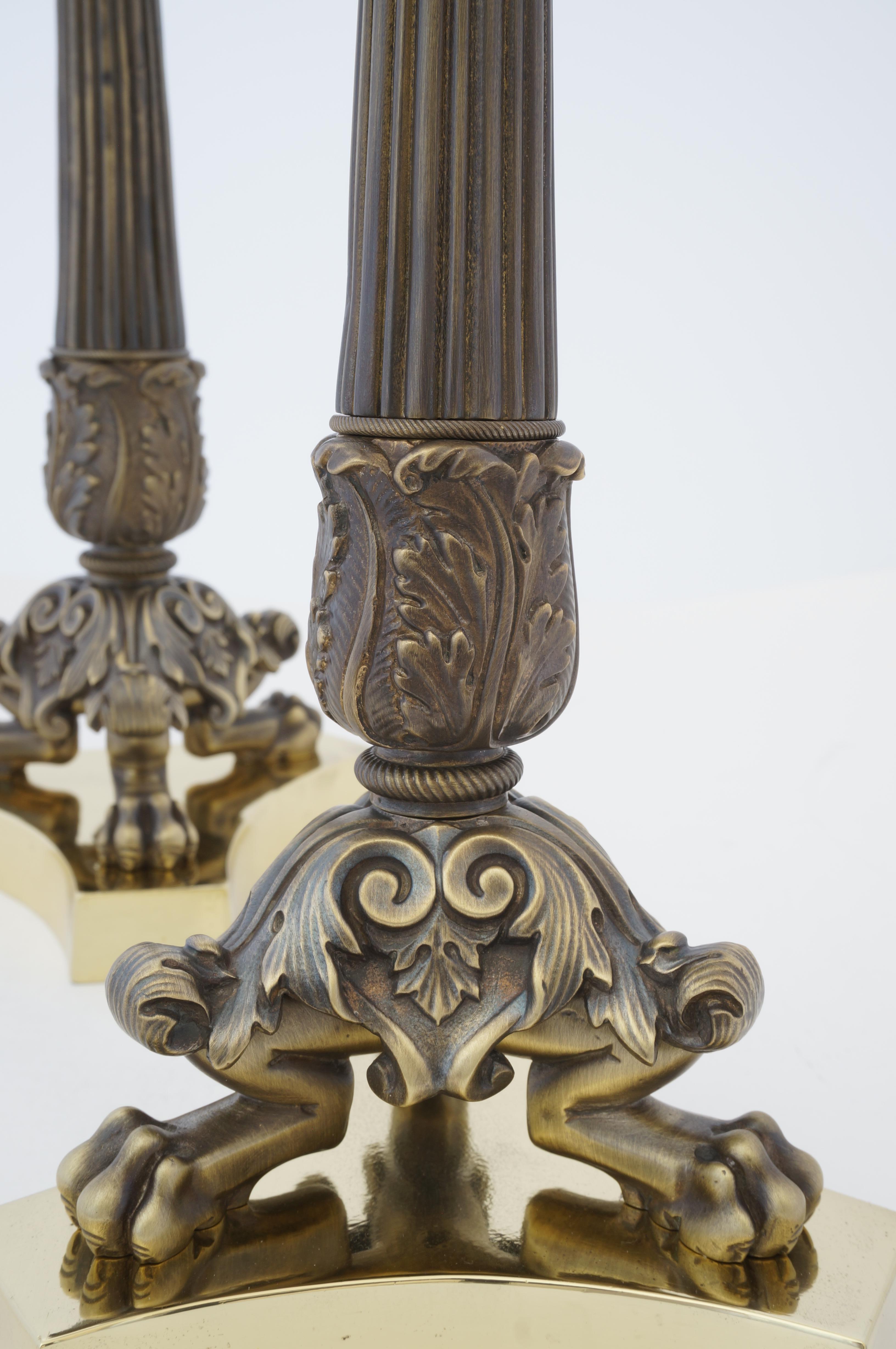 This stylish set of French neo-classical bronze and brass candle sticks have been professional restored.

Note: The pieces have been professionally restored and lacquered to protect the patinated finish.