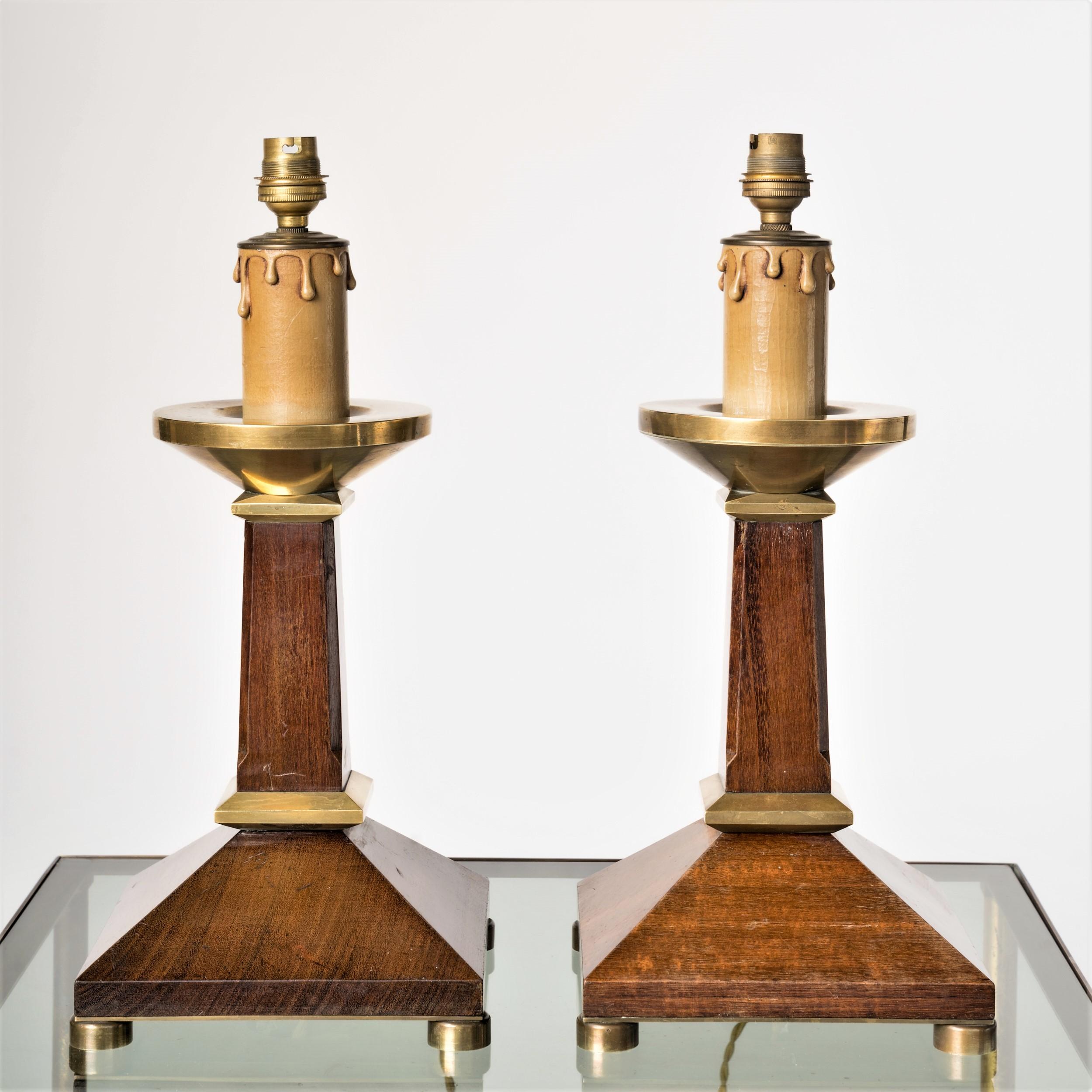 Elegant pair of neo classical table lamps. Mahogany and brass accents.  Faud candle socket decor.  Price includes rewiring for the US. Minor dent on one of the lamps as shown on pictures (on the back side). Minor scratches.
Else in fair vintage