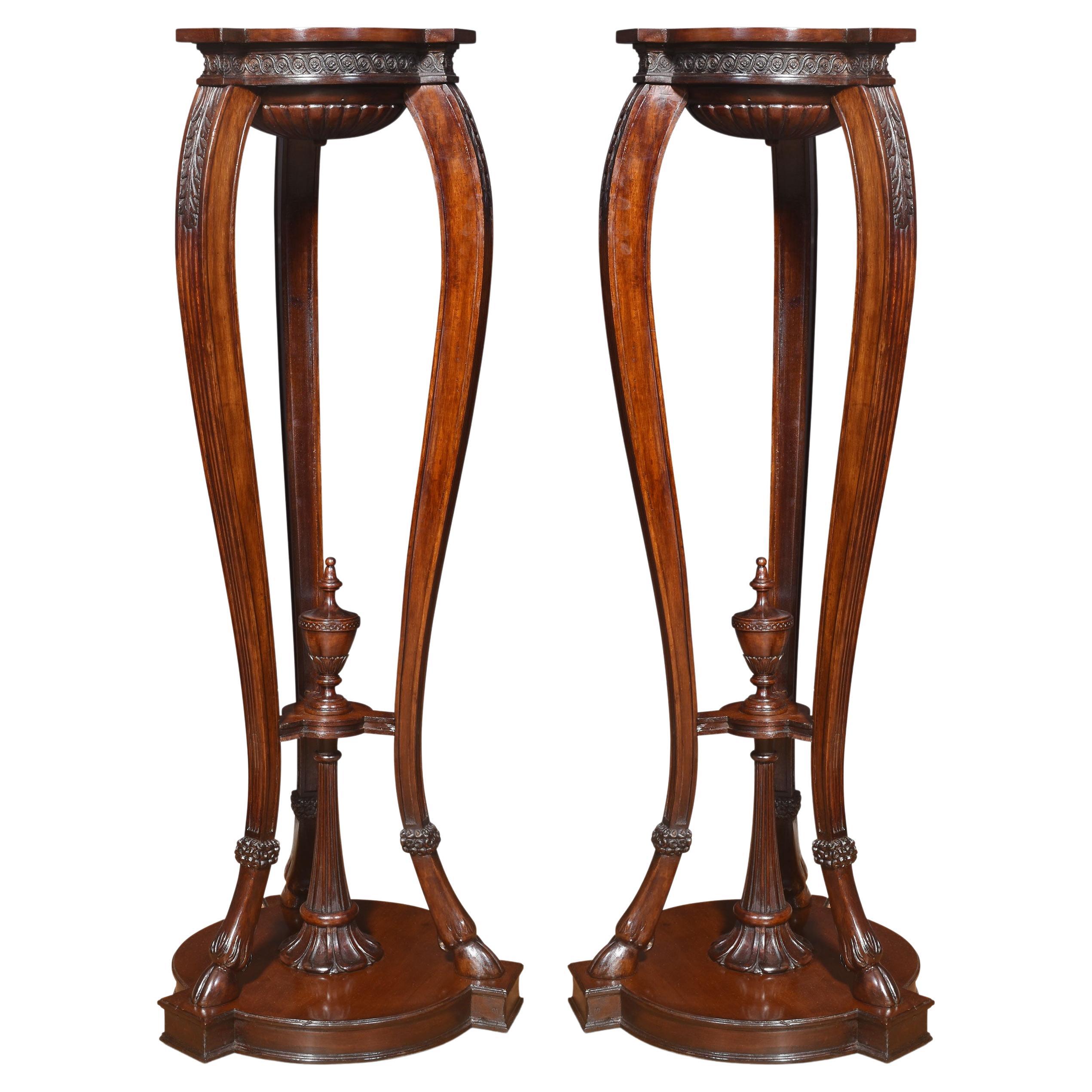 Pair of Neo classical style carved mahogany stands For Sale