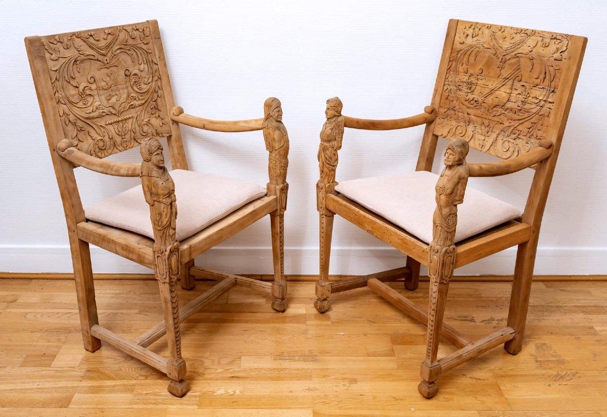 Superb pair of Neo-Gothic ceremonial armchairs in solid walnut, entirely airbrushed, giving them a very airy appearance although their structure remains very much framed by the straight lines of the legs, seat and back. 

They both have a very