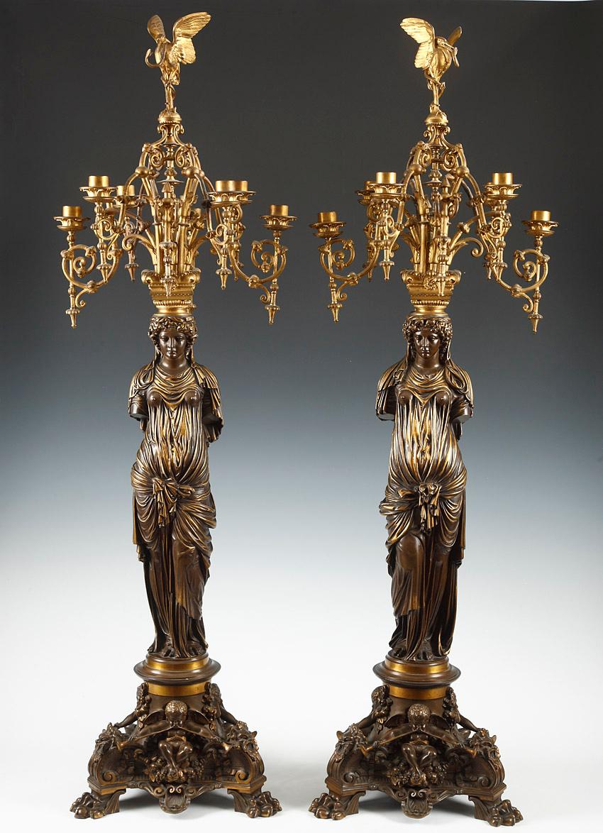Signed F. Barbedienne

Pair of eight light-arm candelabra, made in two patina bronze, in the shape of an antique caryatid, after the model of the statues standing in the 
