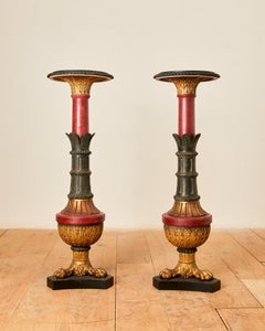 Pair of Neo-Pompeian sculpted stands,  painted, and gilded wood,  circa 1880.