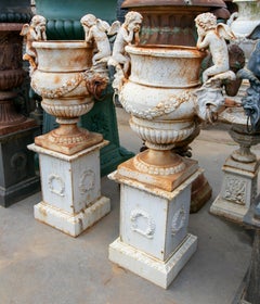 Pair of Neoclassic 1990s Spanish Cast Iron Garden Urns with Putti Angels & Bases