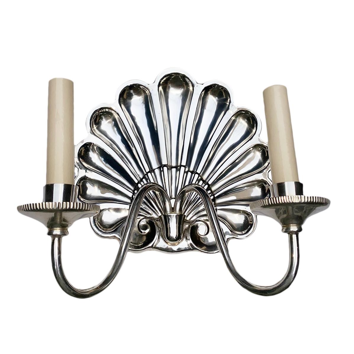 Pair of circa 1950's American silver-plated double-light shell-shaped sconces.

Measurements:
Height: 10.5