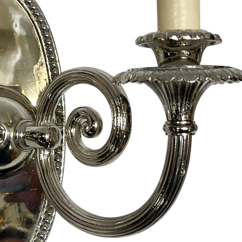 French Pair of Neoclassic Style Silver Sconces For Sale