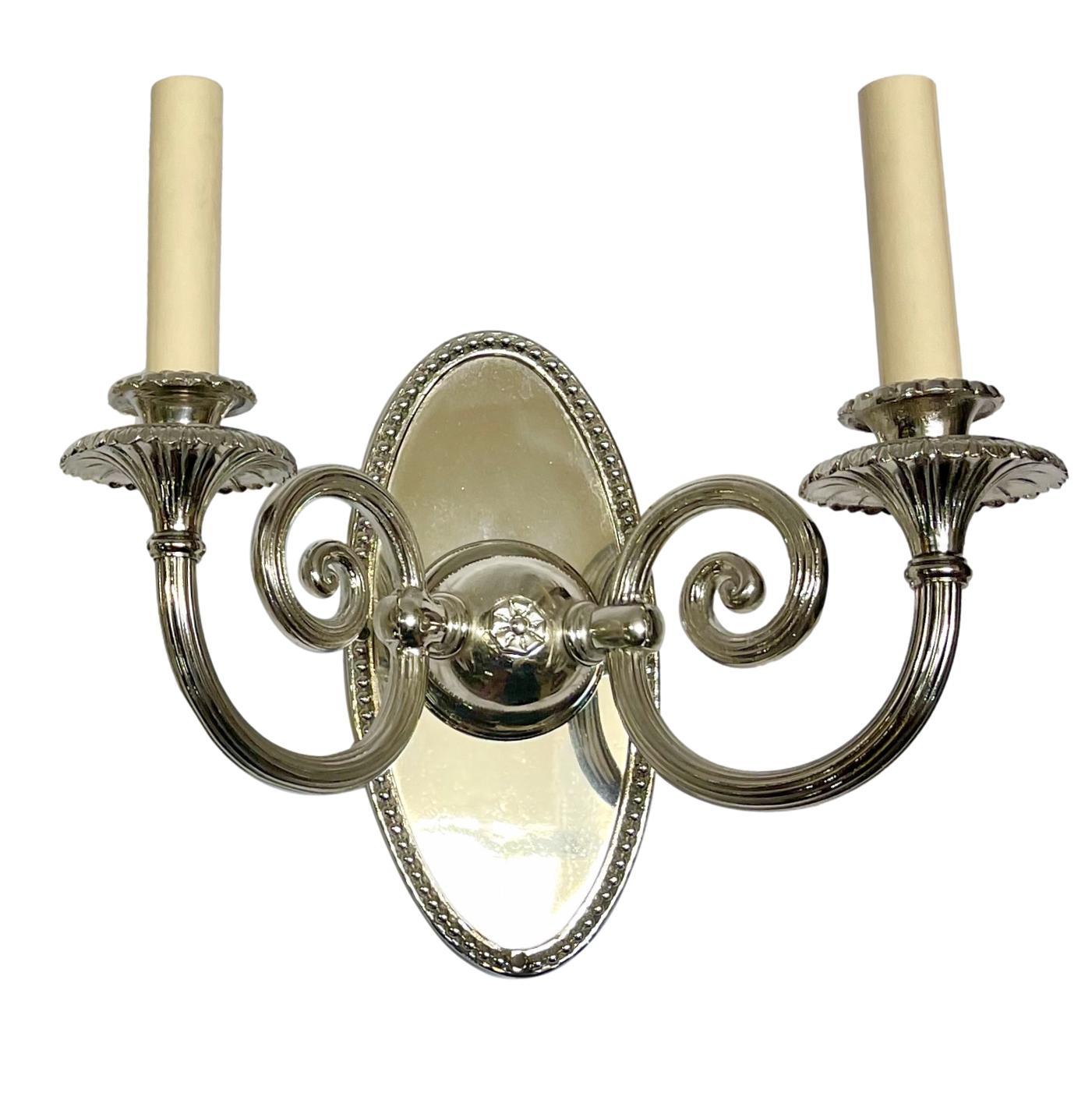 Silvered Pair of Neoclassic Style Silver Sconces For Sale