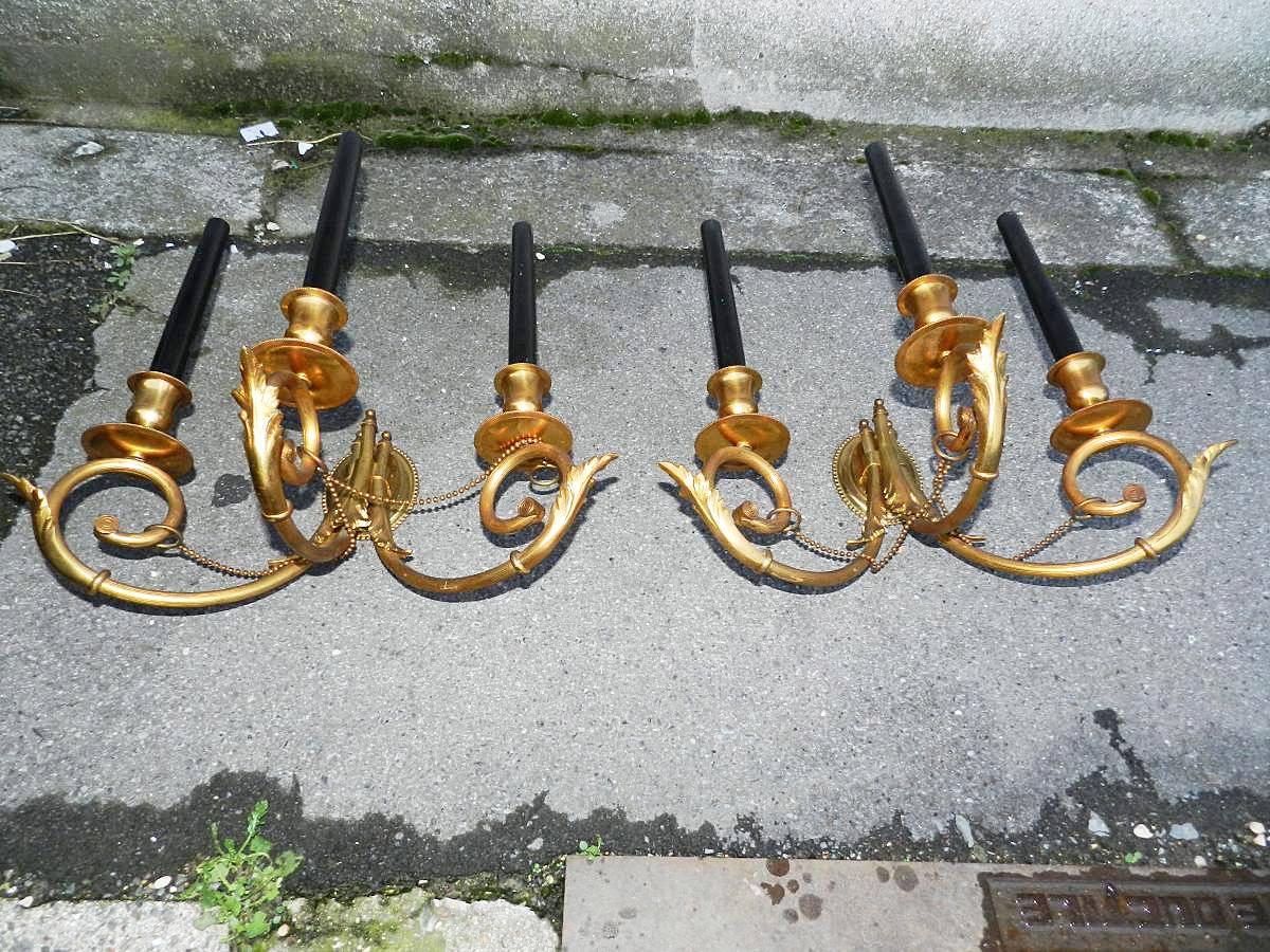 Pair of neoclassical brass sconces, circa 1950.