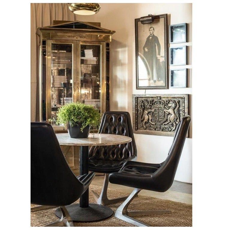 Bold but elegant, these eye-catching Vitrines, bookcases or china cabinets designed and produced by Mastercraft circa 1970s. Exceptionally fine quality, brass-clad frames with black glass pediment and columns flanking the upper and lower doors, and