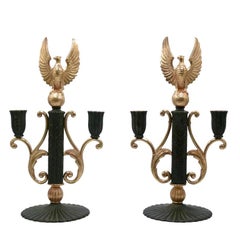 Pair of neoclassical bronze candelabra with eagle