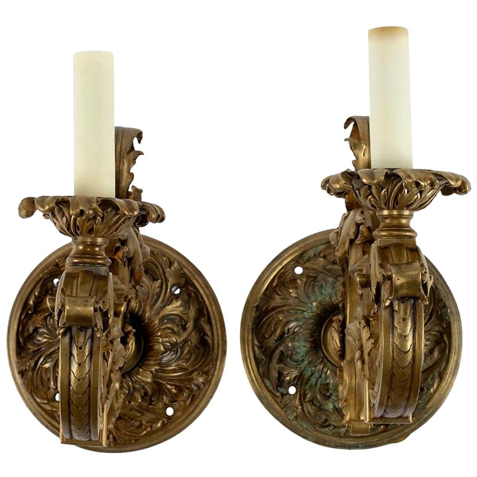 A large 19th century pair of single arm bronze doré single arm sconces from France.