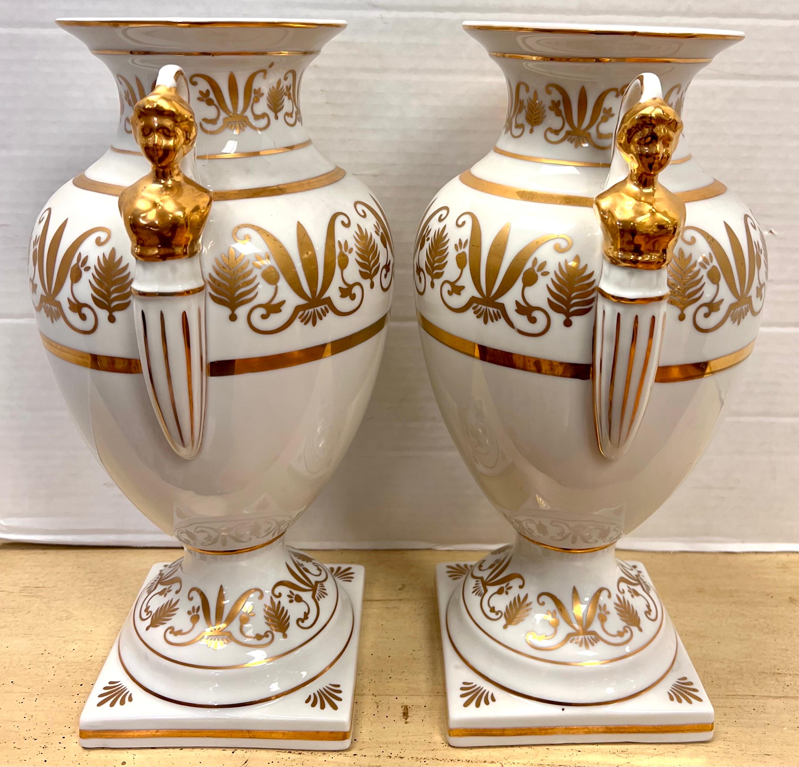 British Pair of Neoclassical Campana Porcelain Gold and White Female Figural Urns