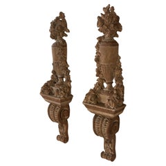 Pair of Neoclassical Carved and Painted Urns on Brackets