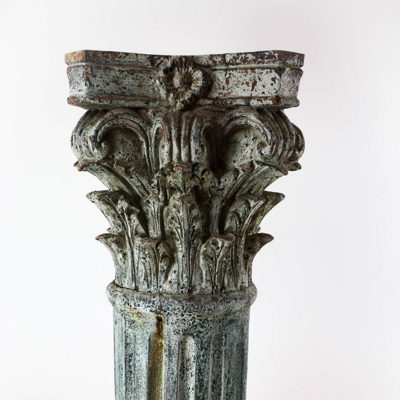 Pale almond green patinated pair of carved neoclassical columns, circa 19 century.
With acanthes leaves around the top.
The patina is from the origin 19th century.