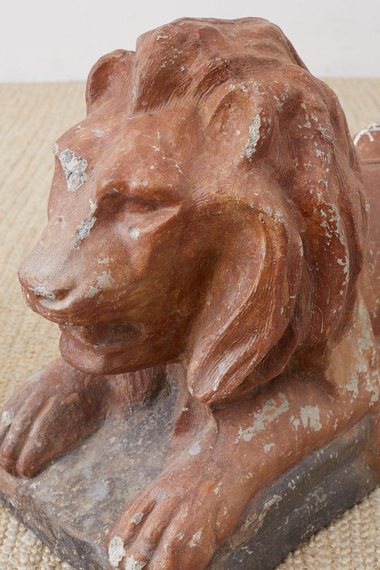 Pair of Neoclassical Cast Stone Recumbent Lion Sculptures at 1stDibs