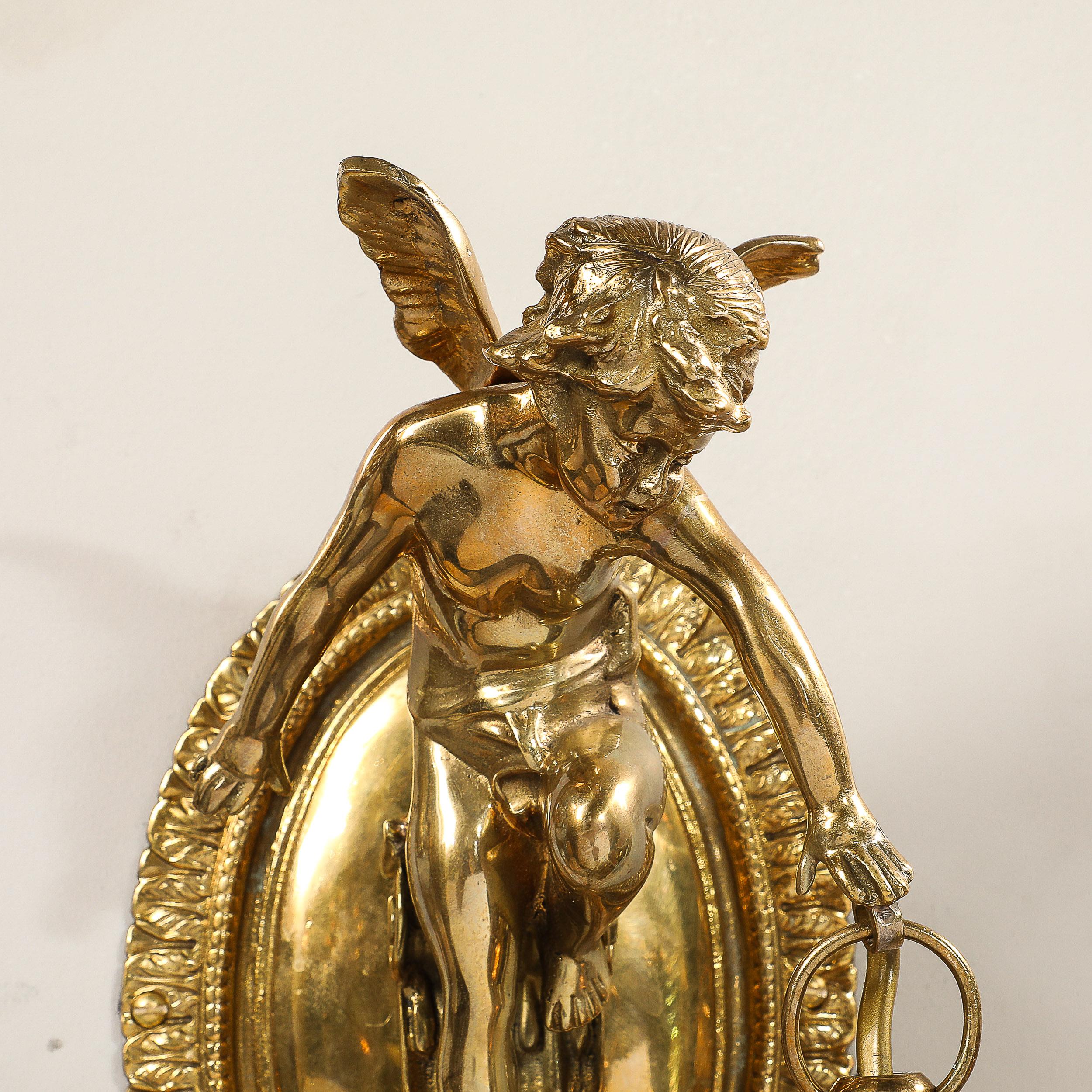 Pair of Neoclassical Cherub Sconces in Antique Brass w/ Smoked Amber Shades In Excellent Condition For Sale In New York, NY