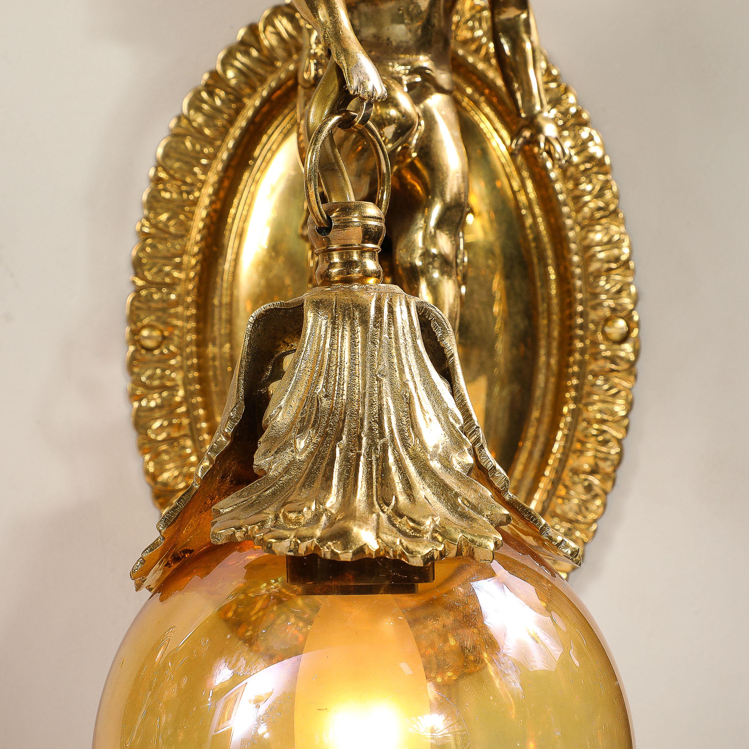20th Century Pair of Neoclassical Cherub Sconces in Antique Brass w/ Smoked Amber Shades For Sale