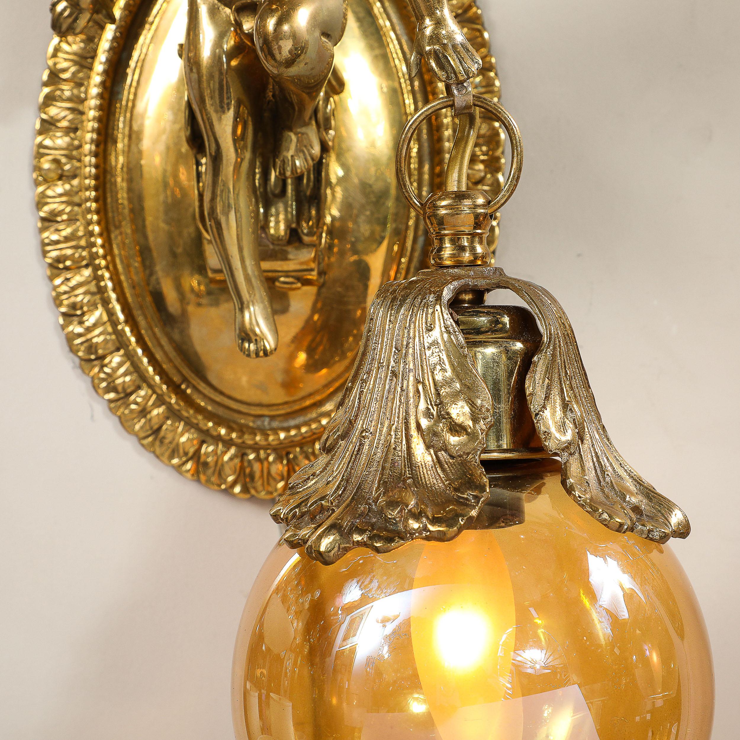 Pair of Neoclassical Cherub Sconces in Antique Brass w/ Smoked Amber Shades For Sale 1