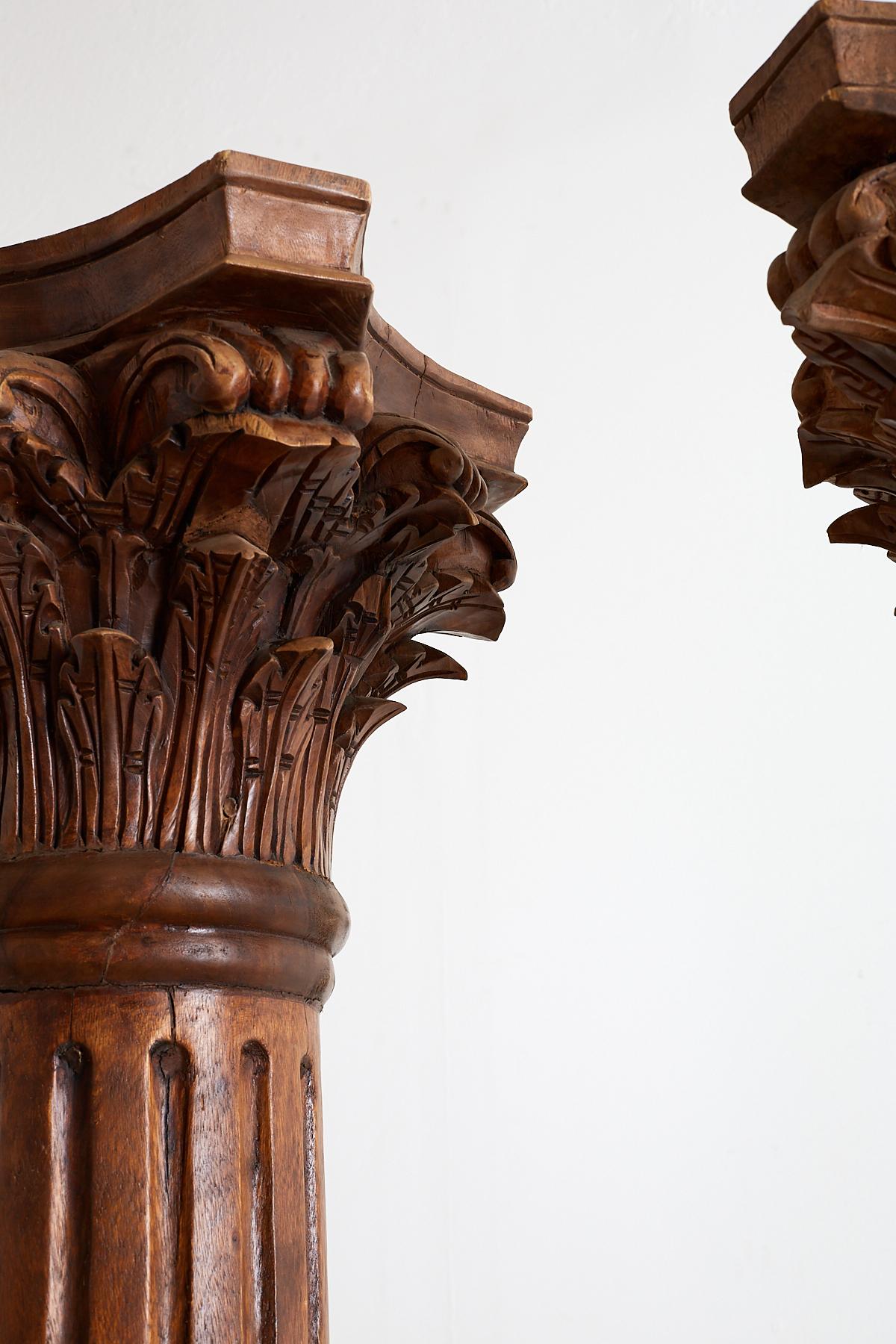 Indian Pair of Neoclassical Corinthian Style Solid Teak Columns