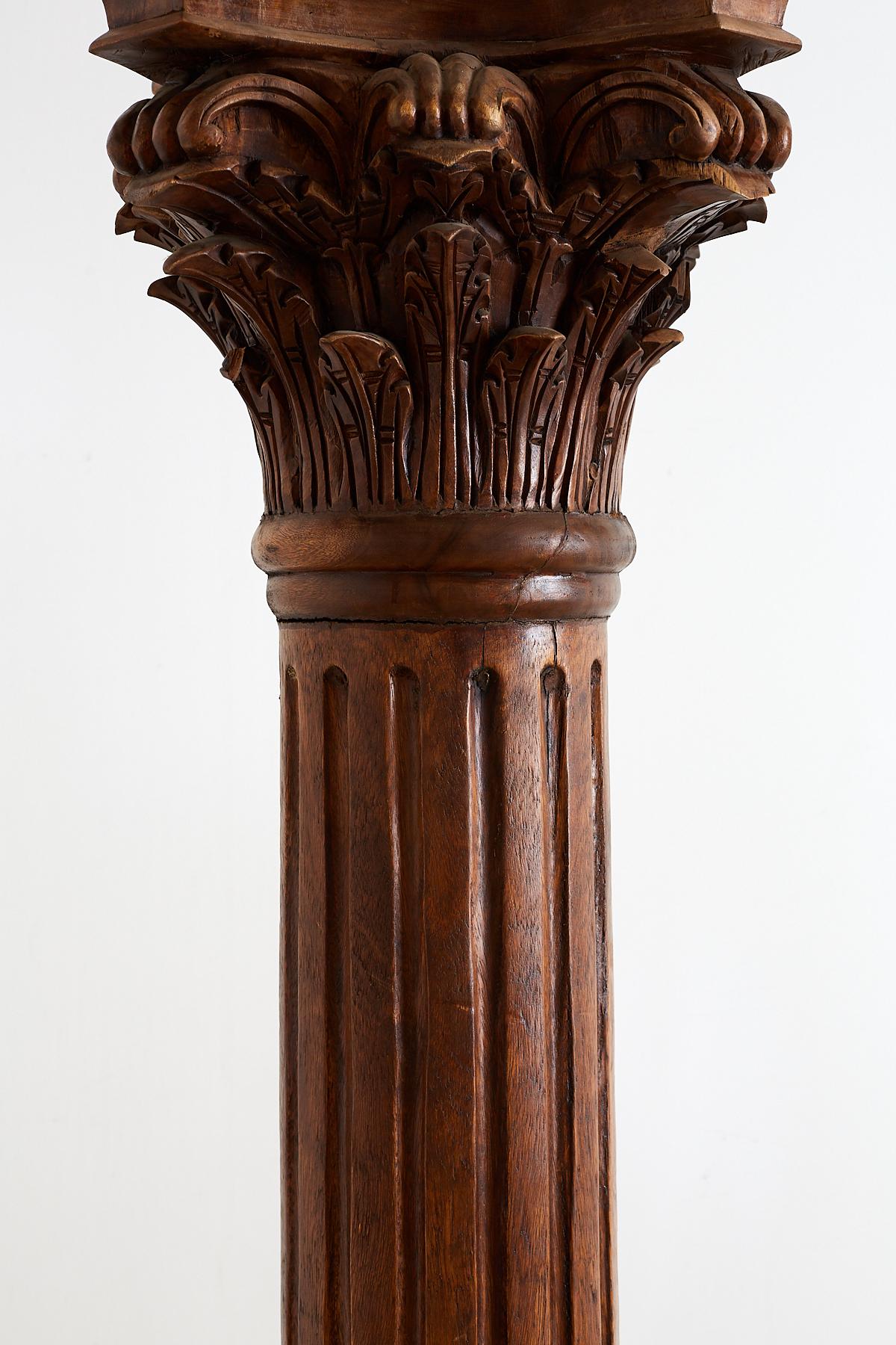 Pair of Neoclassical Corinthian Style Solid Teak Columns In Distressed Condition In Rio Vista, CA