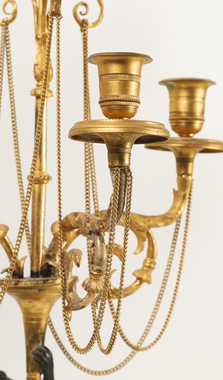 Late 18th Century Pair of Neoclassical Directoire Gilt and Patinated Bronze Figural Candelabras For Sale