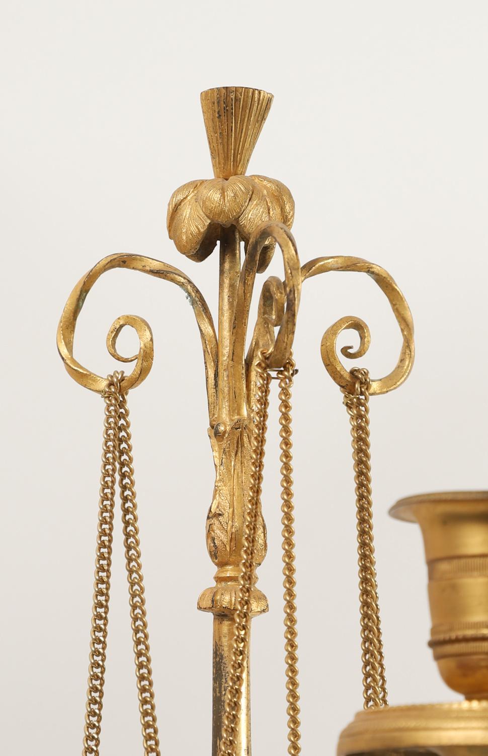 Pair of Neoclassical Directoire Gilt and Patinated Bronze Figural Candelabras For Sale 1