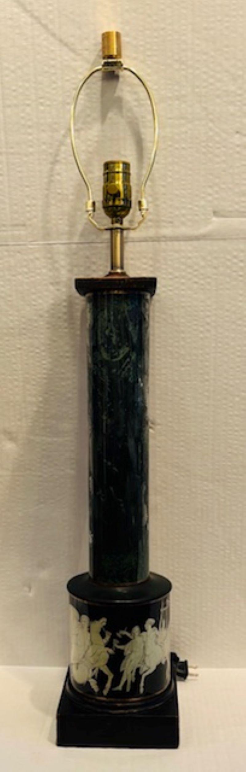 Pair of French neoclassical Eglomise and Decoupage wood column lamps, France, circa 1930s 

Each one of a rosewood cylinder column form with a decoupage vignettes of centaurs and maidens surrounding each base.

