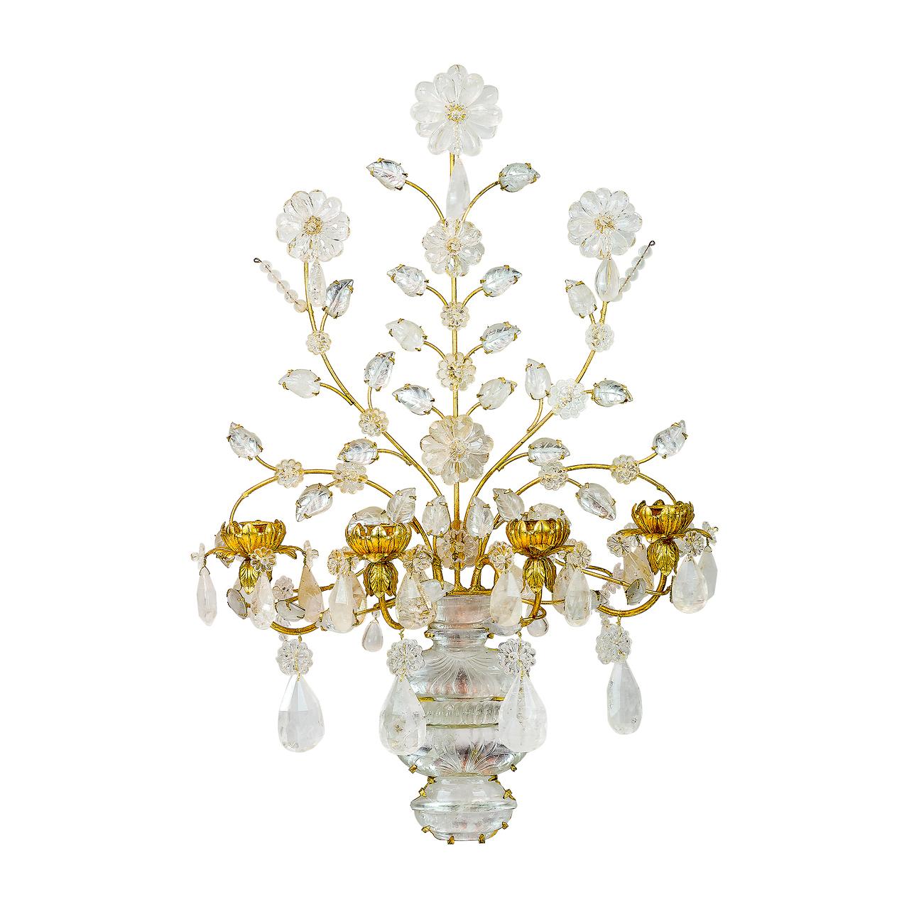An exquisite pair of neoclassical four-light gilt bronze foliage, carved in rock crystal wall sconces attributed to Baguès.

Maker: Baguès Paris
Origin: French
Date: Early 20th century
Dimension: 30 in. x 20 in. x 9 in.