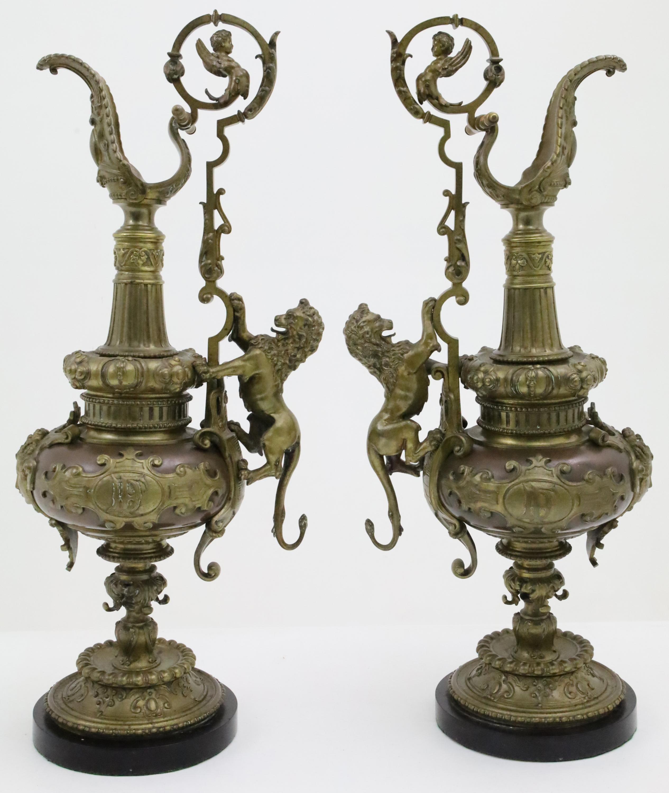 Cast Pair of Neoclassical French Bronze Ewers For Sale