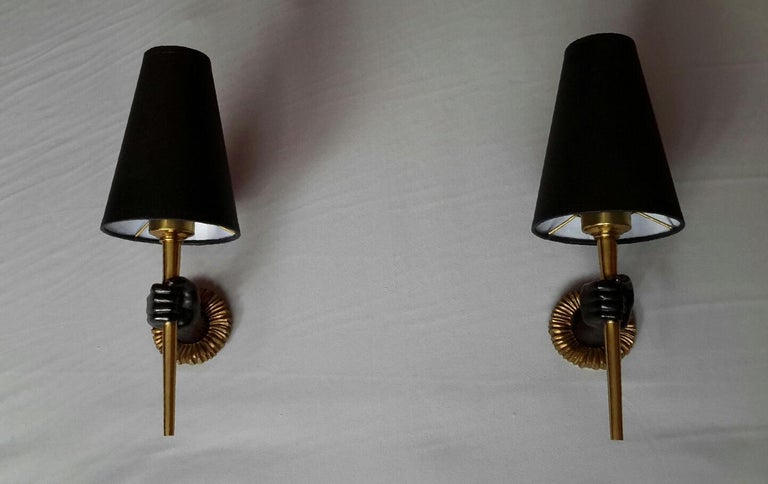 Mid-20th Century Pair of Neoclassical Gilt Bronze and Black Sconces, John Devoluy, France, 1960