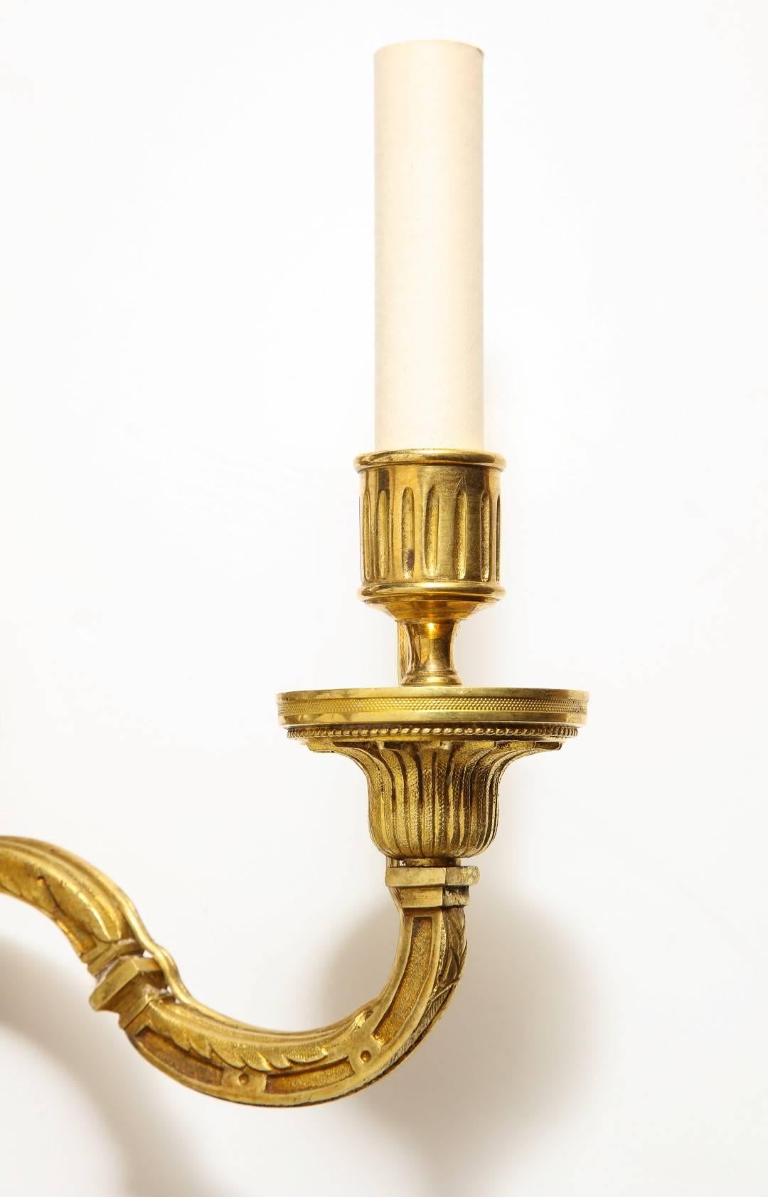 Pair of Neoclassical Gilt Bronze Sconces In Excellent Condition In New York, NY