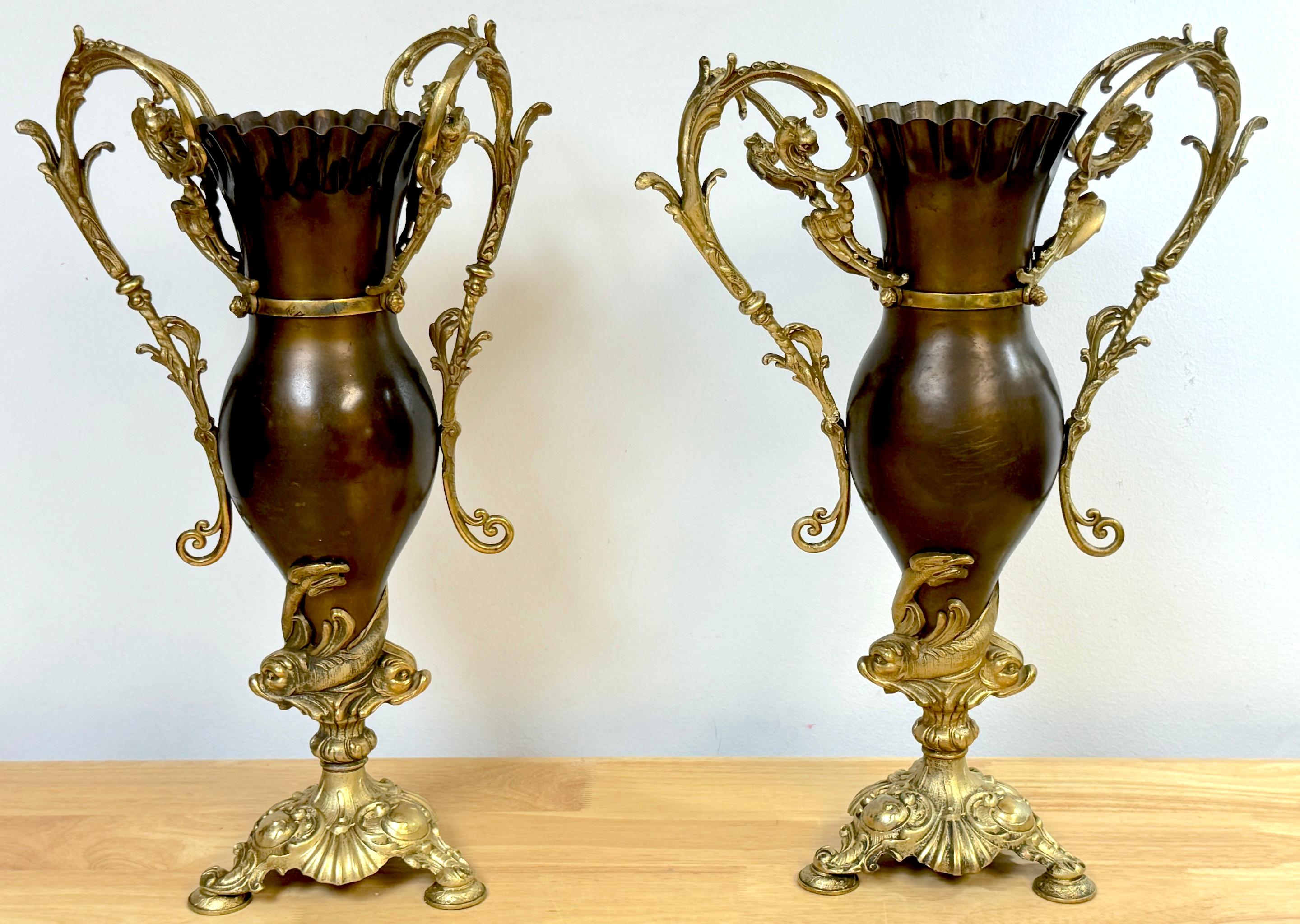 Pair of Neoclassical Gilt & Patinated Dolphin Motif Vases by Bradley & Hubbard, USA, circa 1890s

A stunning pair of Neoclassical Gilt & Patinated Dolphin Motif Vases by Bradley & Hubbard, USA, circa 1890s. Each vase stands 20 inches high, 14 inches