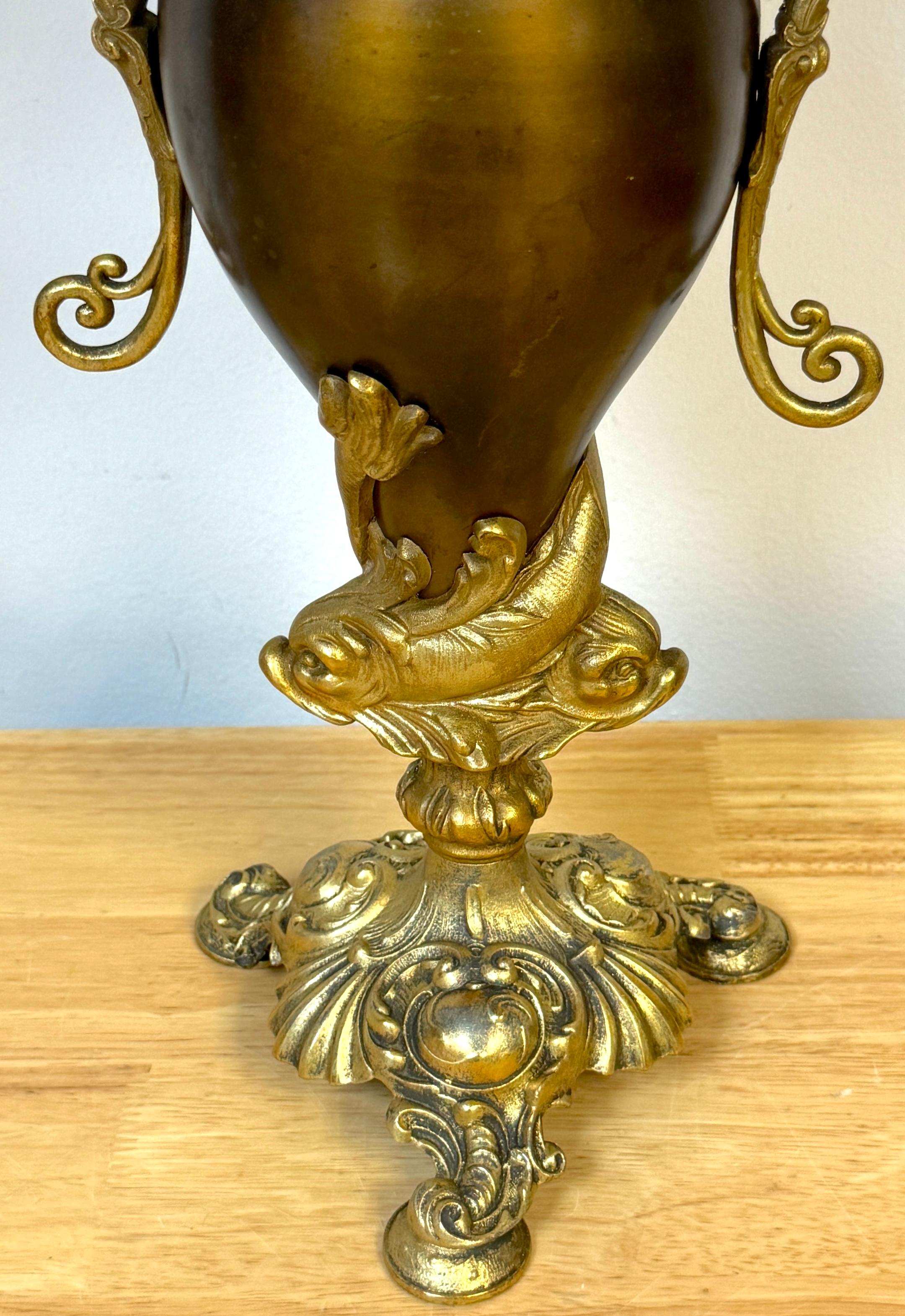 Pair of Neoclassical Gilt & Patinated Dolphin Motif Vases by Bradley & Hubbard In Good Condition For Sale In West Palm Beach, FL