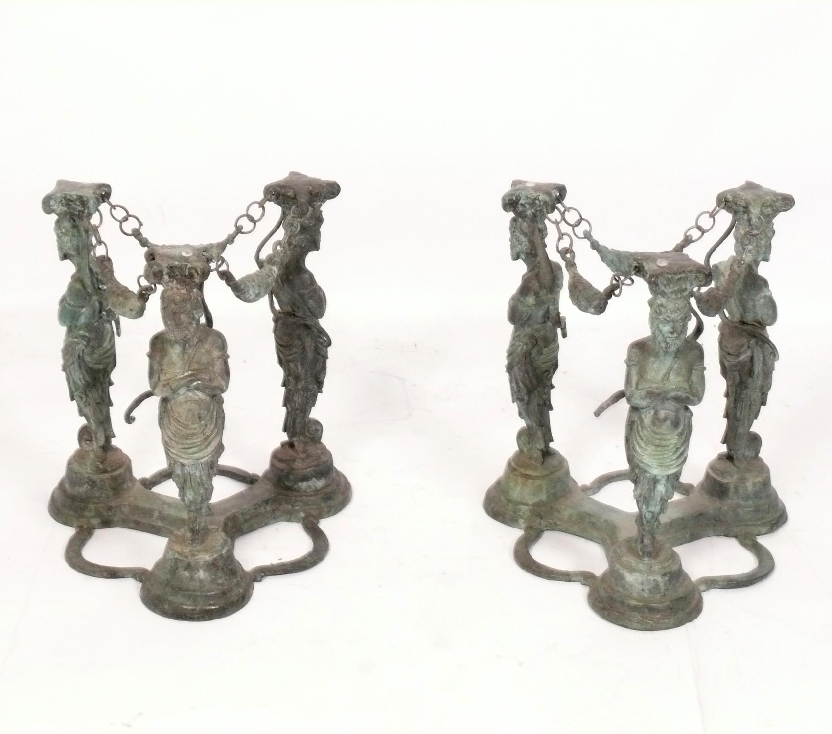 Pair of Neoclassical Grecian Bronze Figural End Tables, believed to be circa 1940s, possibly much earlier. They retain their warm original verdigris patina. The price noted does not include the glass tops, as they have various chips, scratches, and