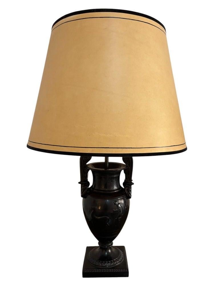 Pair of Neoclassical Lamps,
Antique Vase Decor,
Black Resin,
Circa 1970s, France.
Height 85 cm with shade
Base Diameter 16 x 16 cm