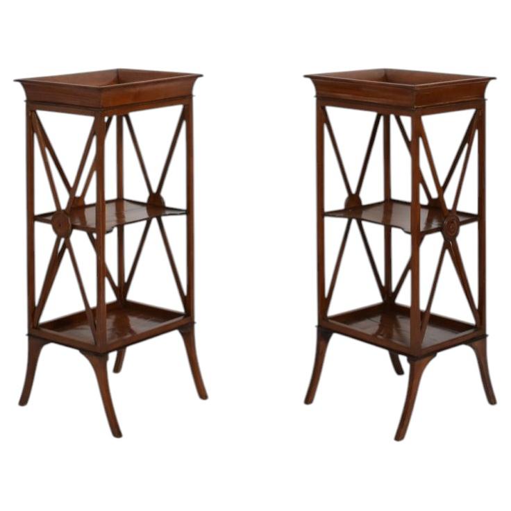 Pair of neoclassical mahogany bedside tables, 1960s.