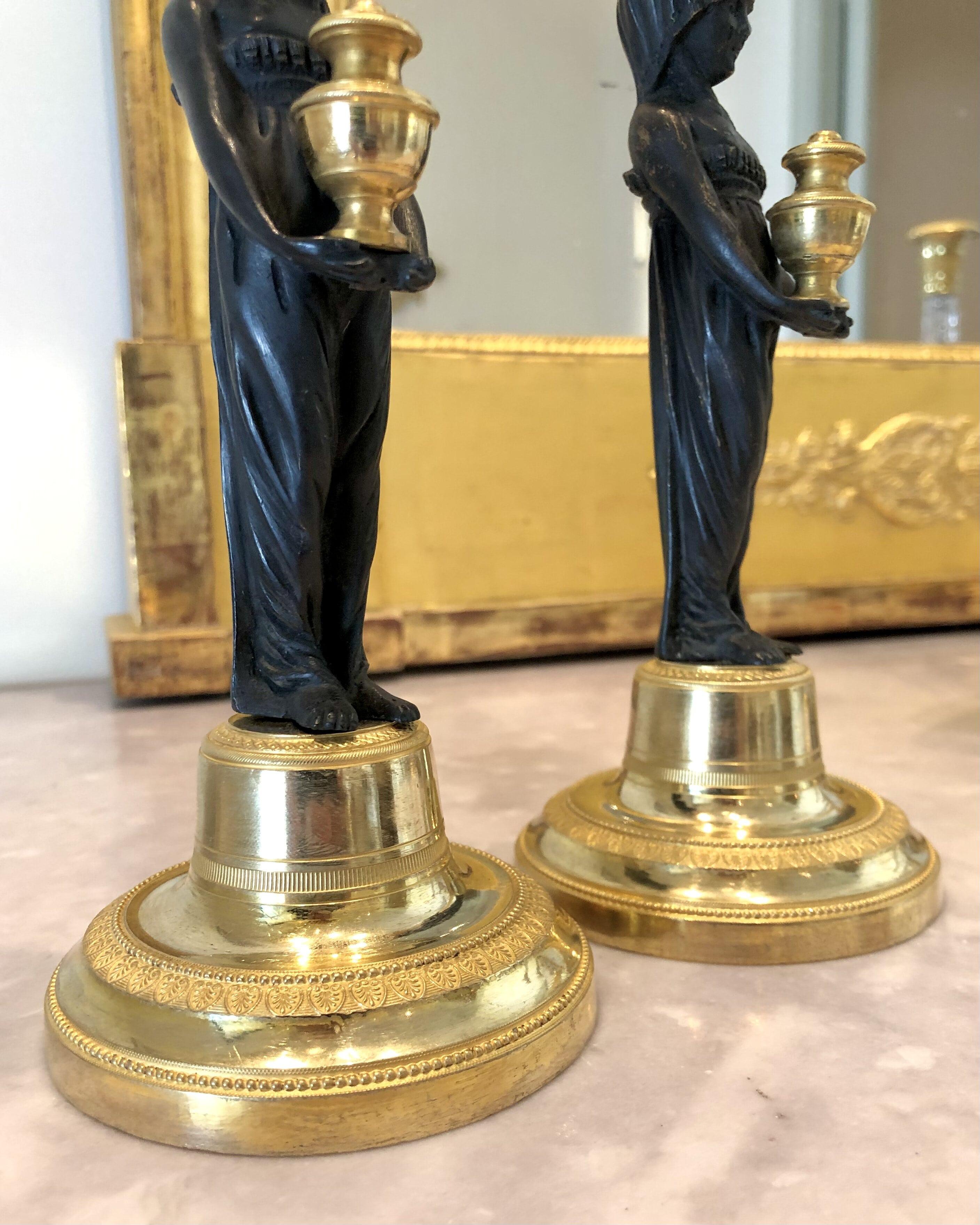 Pair of Neoclassical Ormolu Patinated Candlesticks with Vestal Figures In Good Condition In Madrid, MD