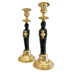 Pair of Neoclassical Ormolu Patinated Candlesticks with Vestal Figures