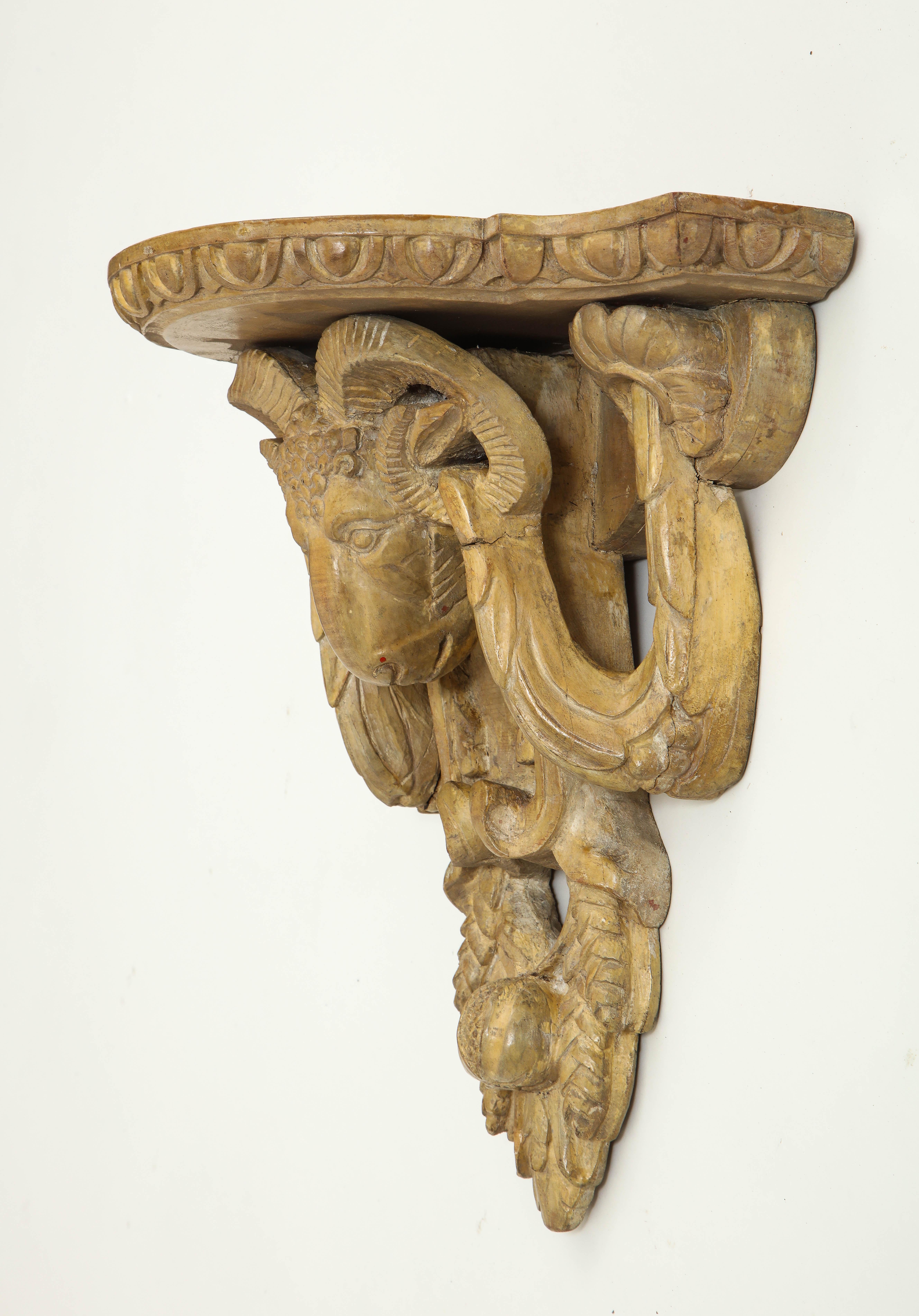Pair of Neoclassical Ram's Head Limed Wall Brackets In Good Condition In New York, NY